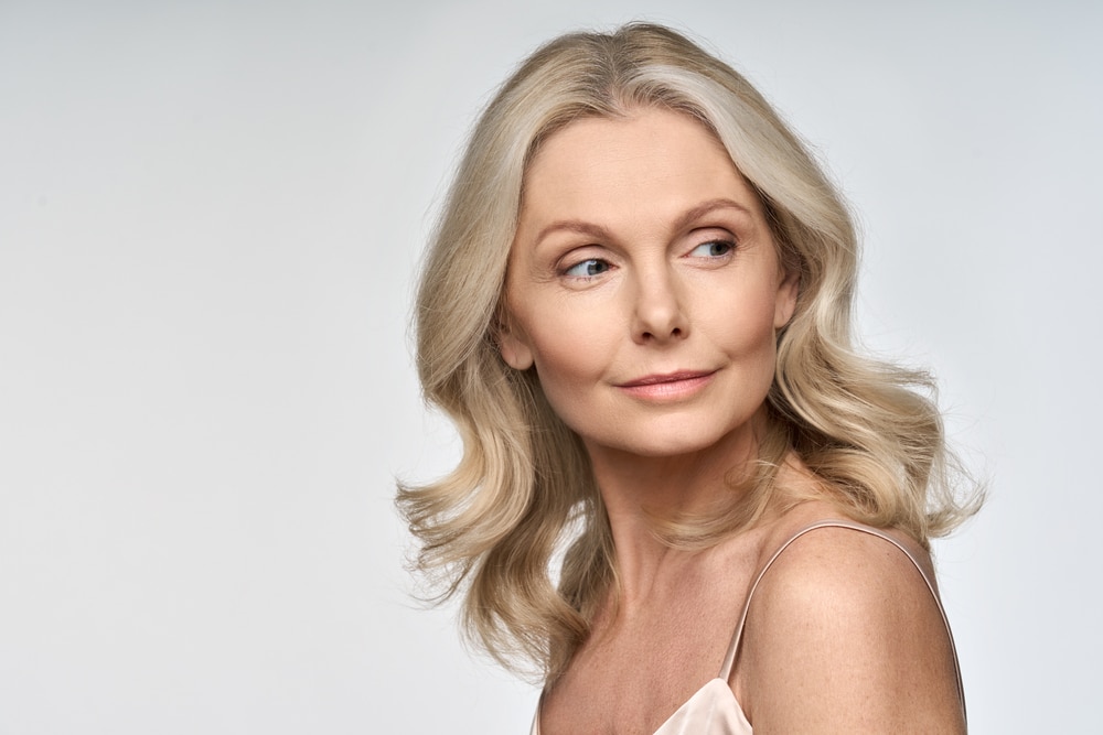 Mature woman with smooth facial appearance representing natural-looking Dysport results in Palm Beach Gardens.